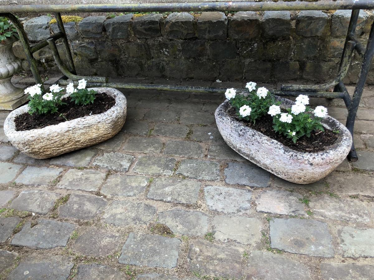 Pair of concrete planters . 58cm x37cm.and 21cmhigh